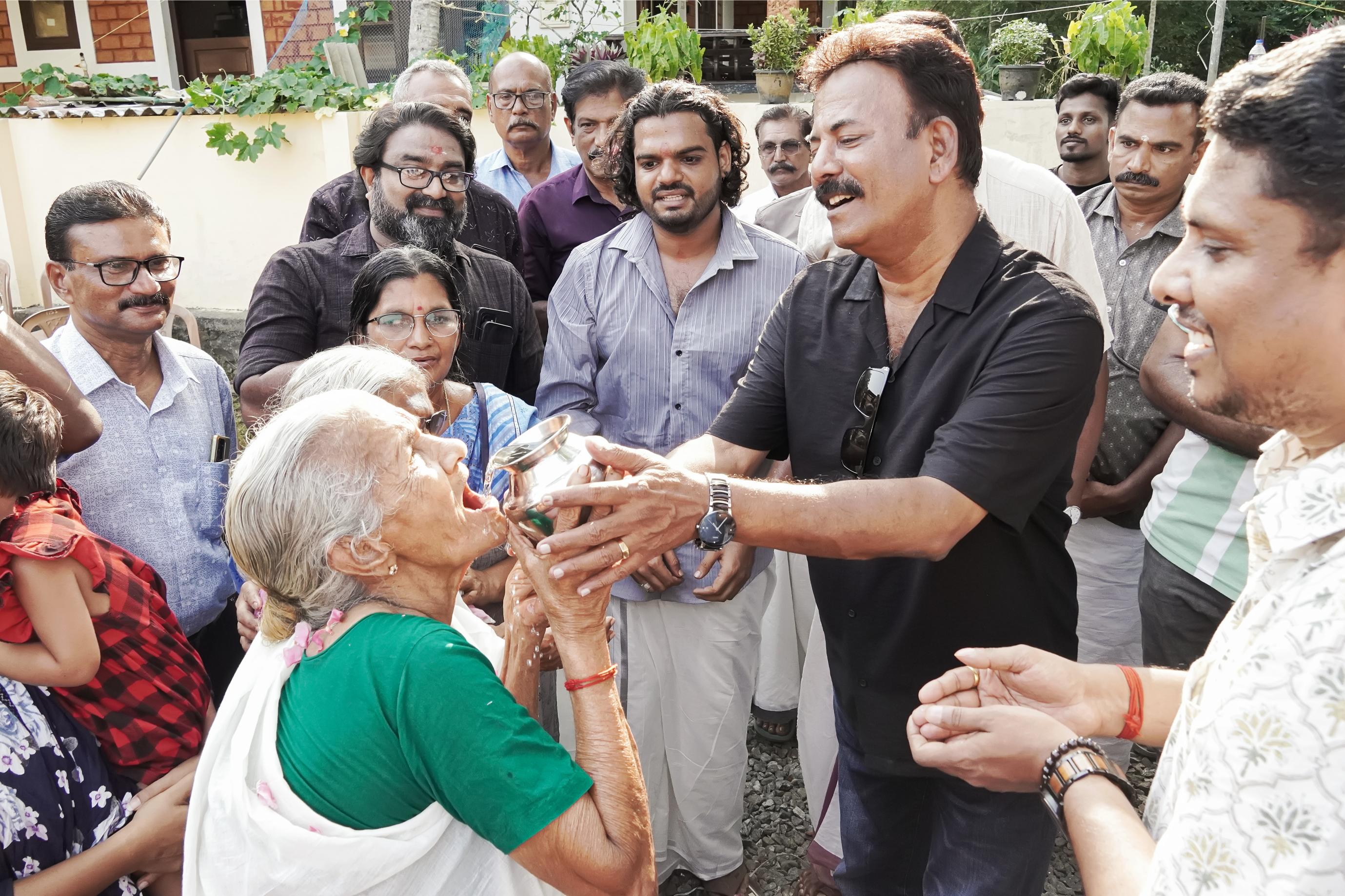 Elderly resident receiving an access card